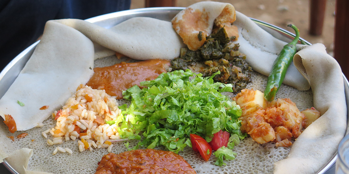An Ethiopian meal laid out on flat-bread